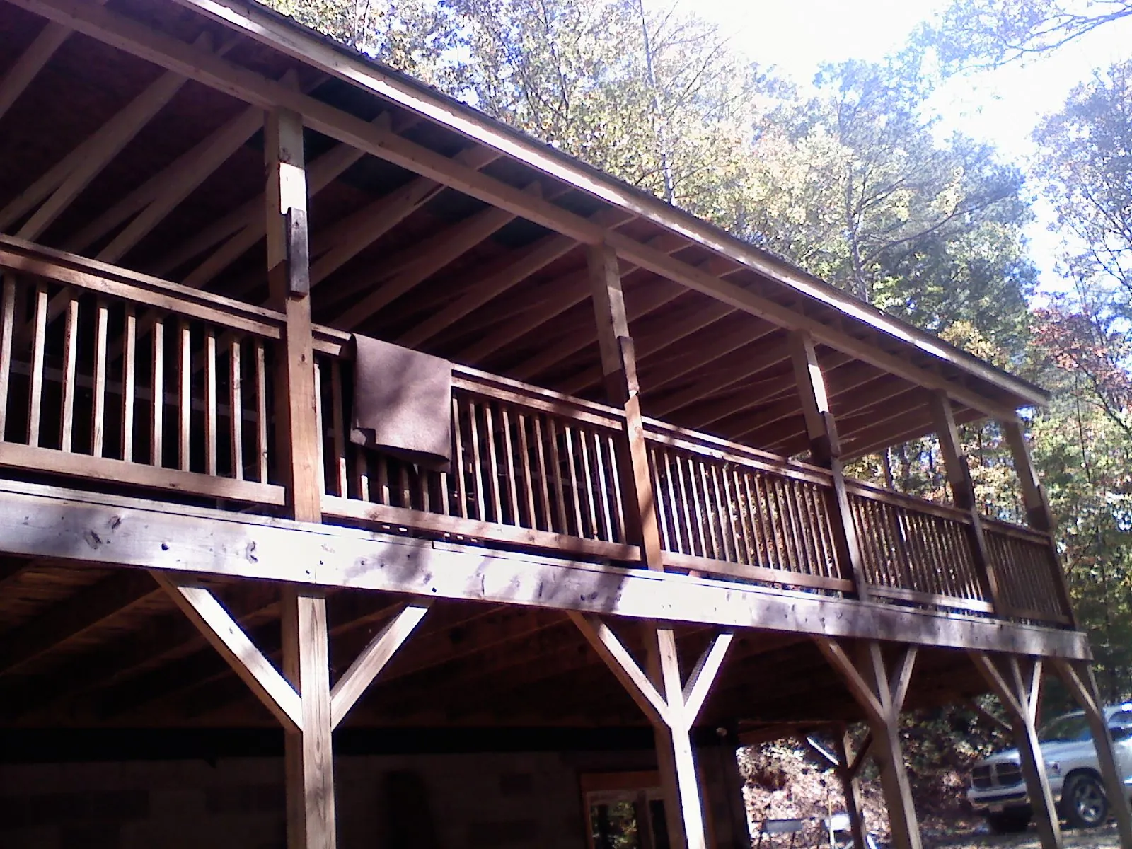 Timber framing under a new elevated porch and deck — Roof Leak Repair in Hay Springs by Roofing Brothers